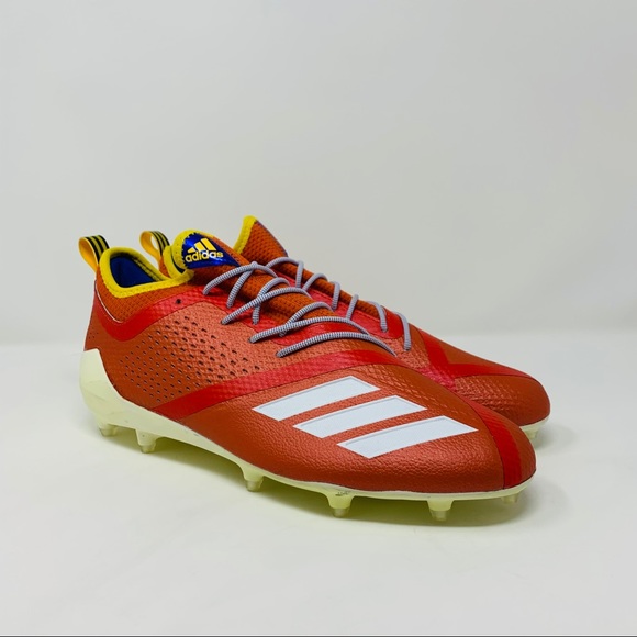 red and yellow football cleats